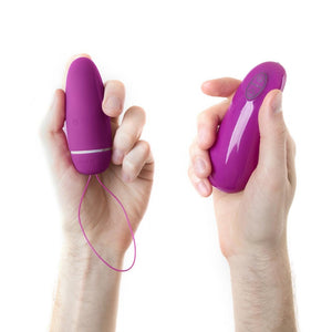 B-Swish Bnaughty Deluxe Unleashed Bullet Vibrator - RASPBERRY on hands