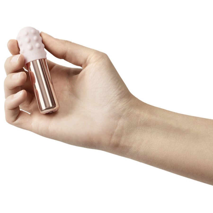 Le Wand Chrome Bullet Massager on hands