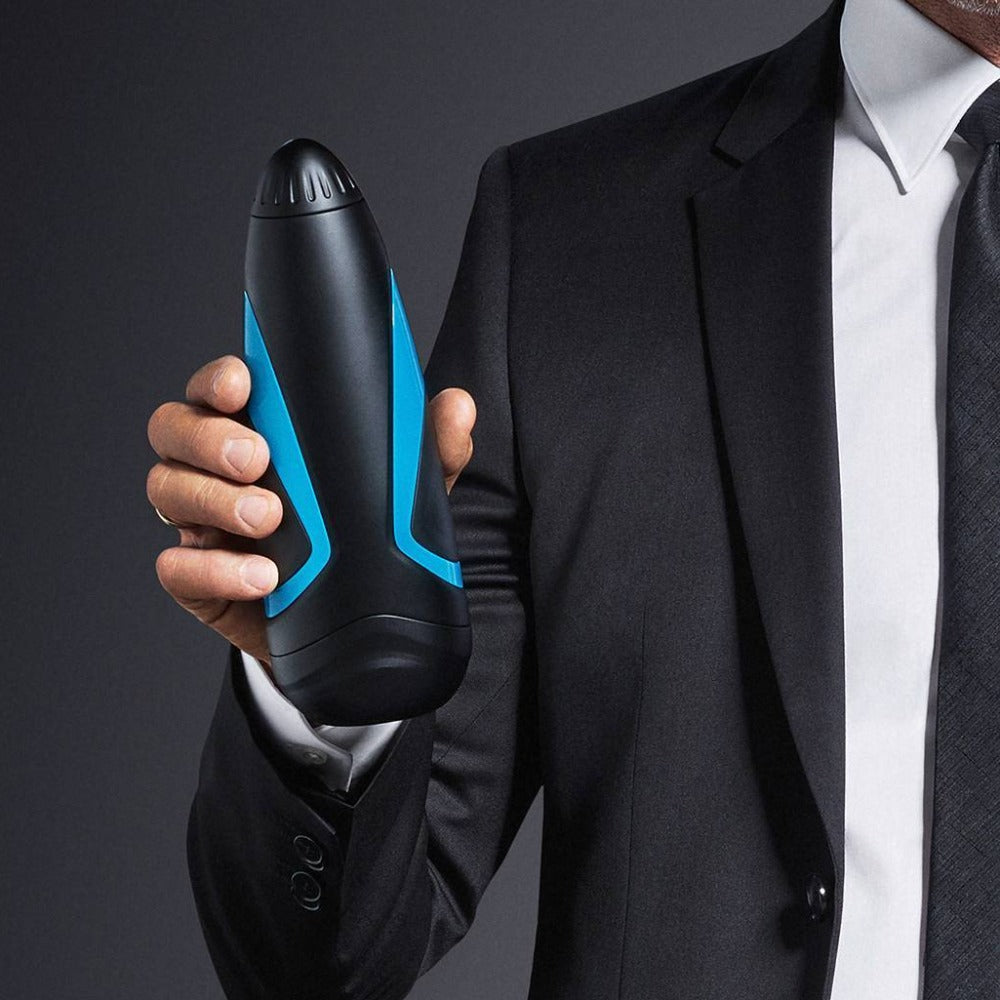 Man holding a Satisfyer Men One Textured Fleshlight 